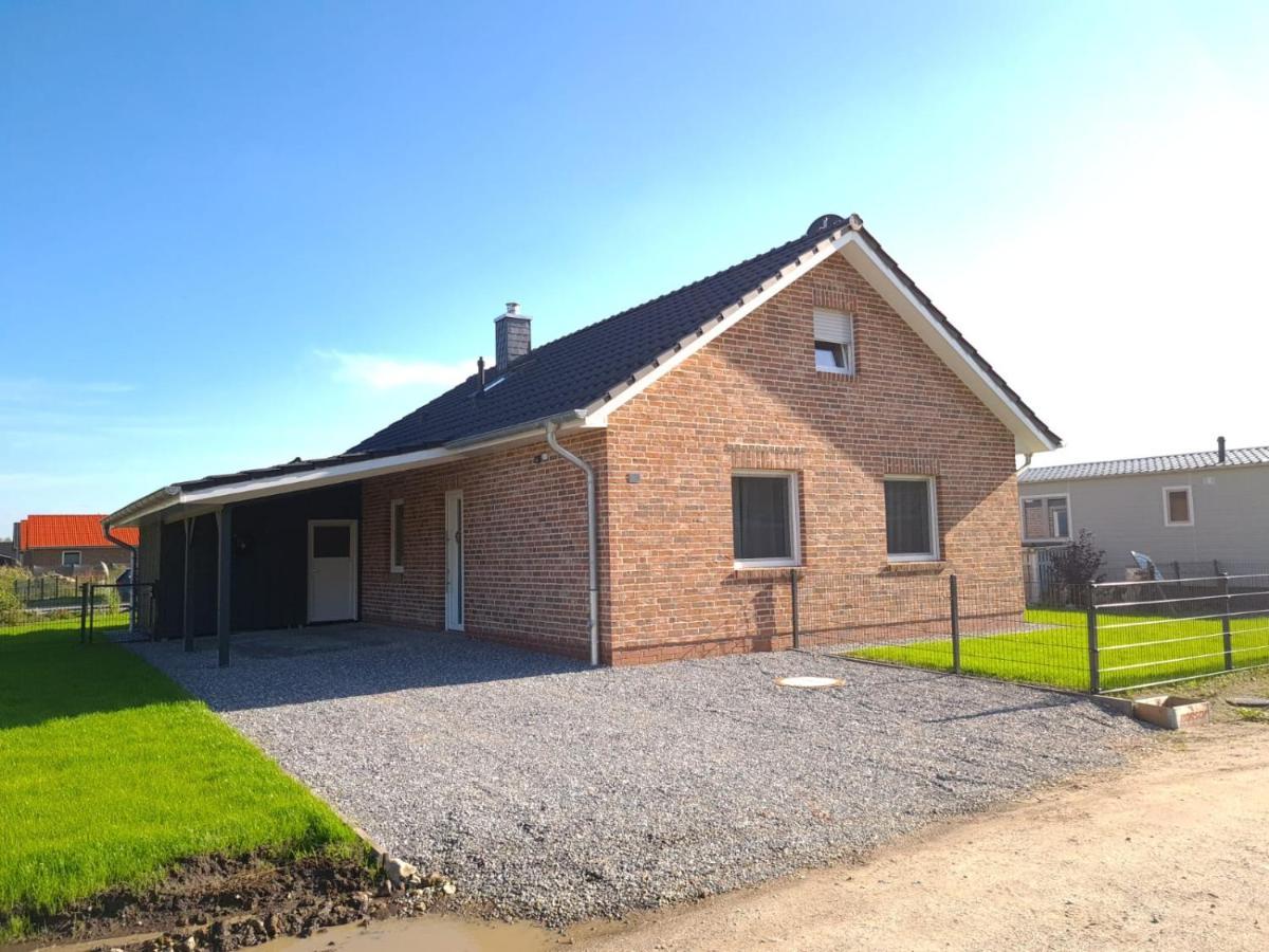 Haus Kustenbrise: Coastal Pet-Friendly Retreat with Garden, Sauna, and Fireplace Schweiburg Exterior photo